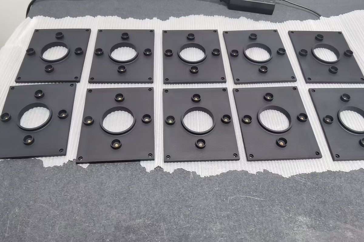 3D-printed components laid out in a row